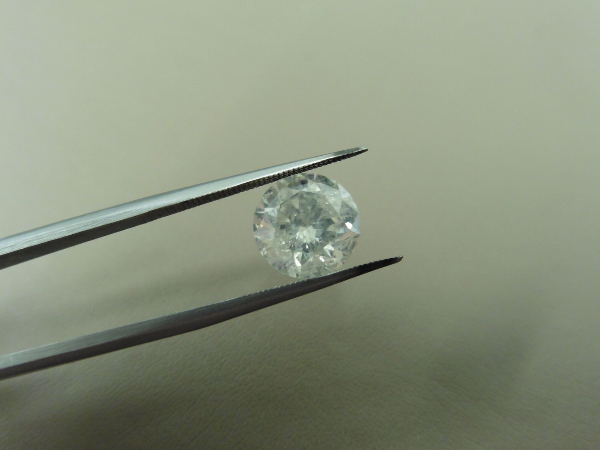 2.26ct enhanced brilliant cut diamond. F colour and I2 clarity ( enhanced). EGL certification.