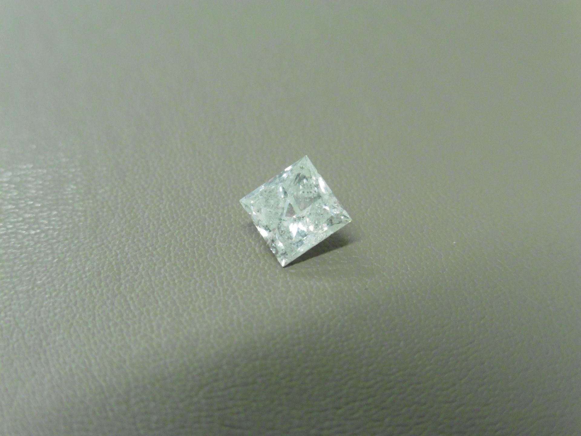 1.01ct enhanced princess cut diamond. H/I colour and I2 clarity. No certification but can be done