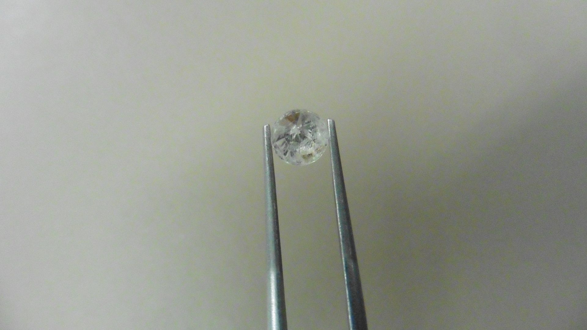 1.01ct Brilliant Cut Diamond, Enhanced stone.I colour, I2 clarity. 6.34 x 3.93mm. Valued at £1490. - Bild 2 aus 5