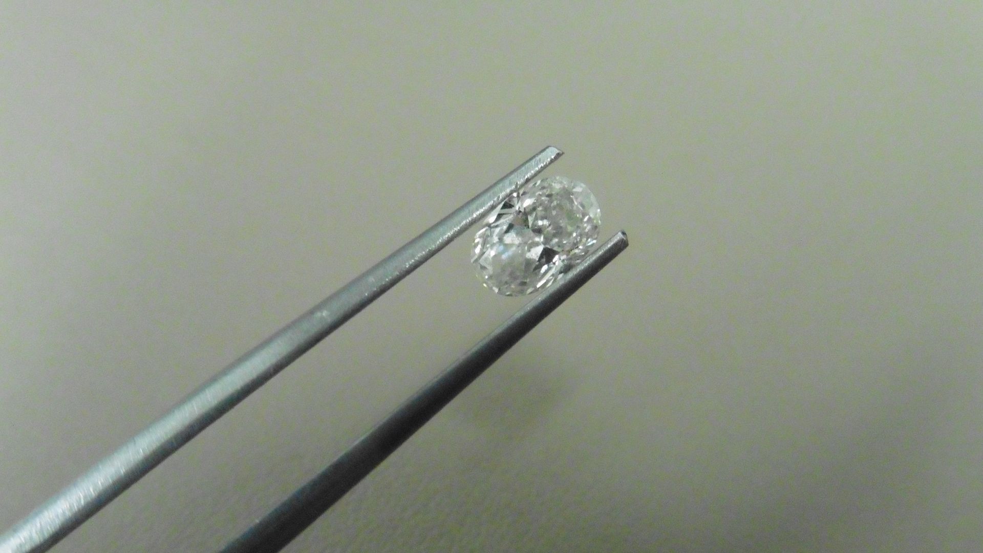 0.60ct natural loose oval cut diamond. I colour and si2 clarity. 6.86 x 4.49 x 2.67mm. No