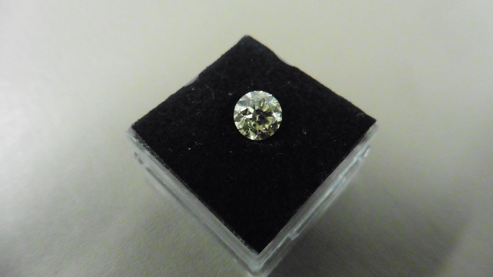 1.26ct Brilliant Cut Diamond, Enhanced stone. J colour, si3 clarity. 6.75 x 4.32mm. Valued at £1490. - Image 5 of 5