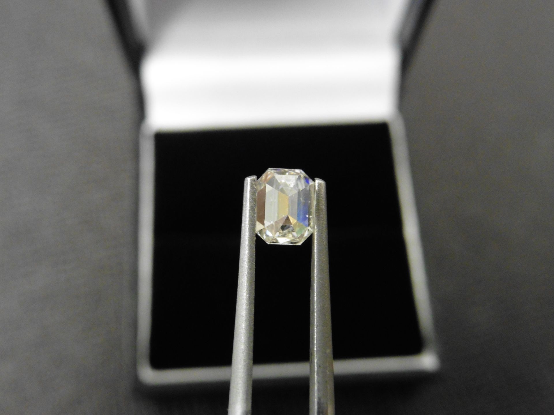 0.61ct natural emerald cut diamond. I colour and SI2 clarity. No certification but can be done - Image 3 of 4