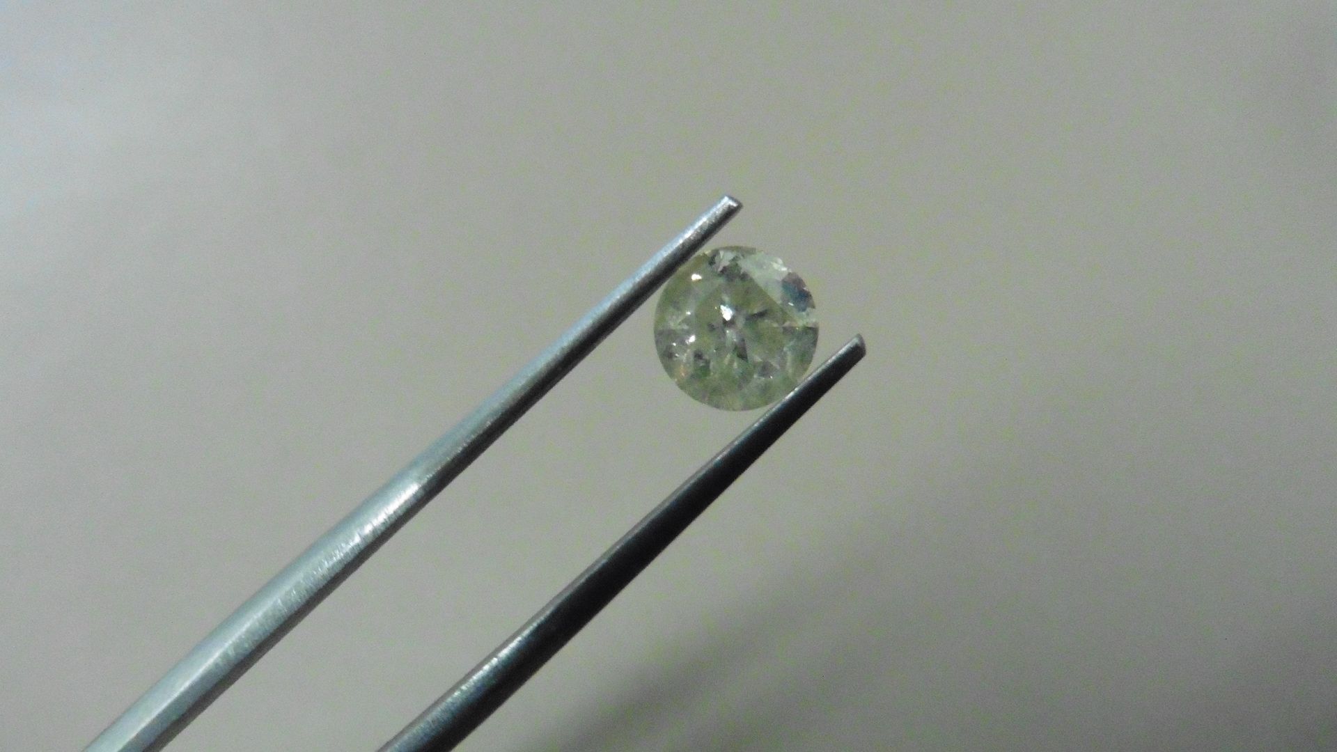 1.00ct Brilliant Cut Diamond, Enhanced stone.H colour, I2 clarity. 6.35 x 4.44mm. Valued at £1490.No