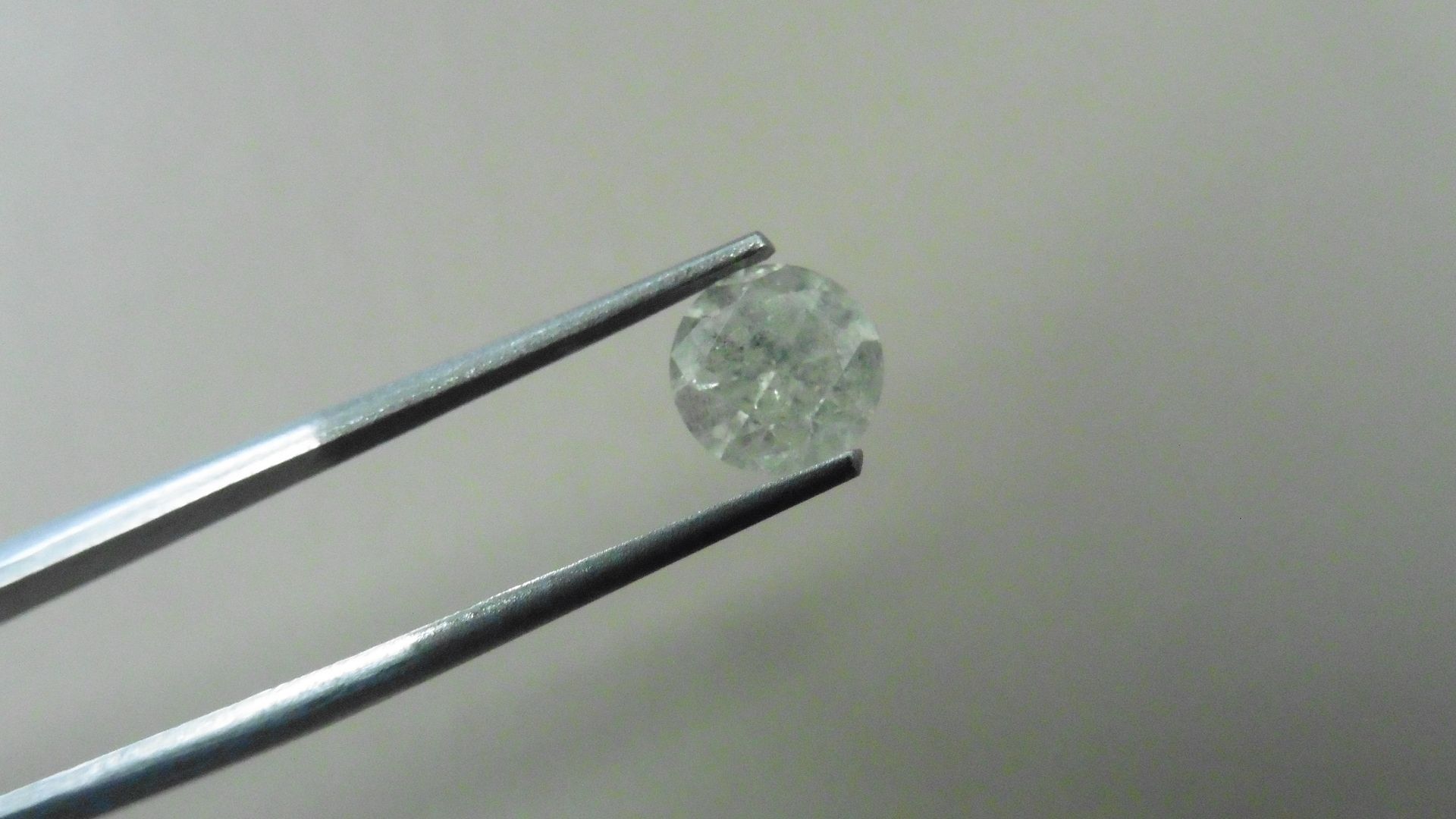 1.37ct Brilliant Cut Diamond, Enhanced stone. I colour, I2 clarity. 6.91 x 4.30mm. Valued at £