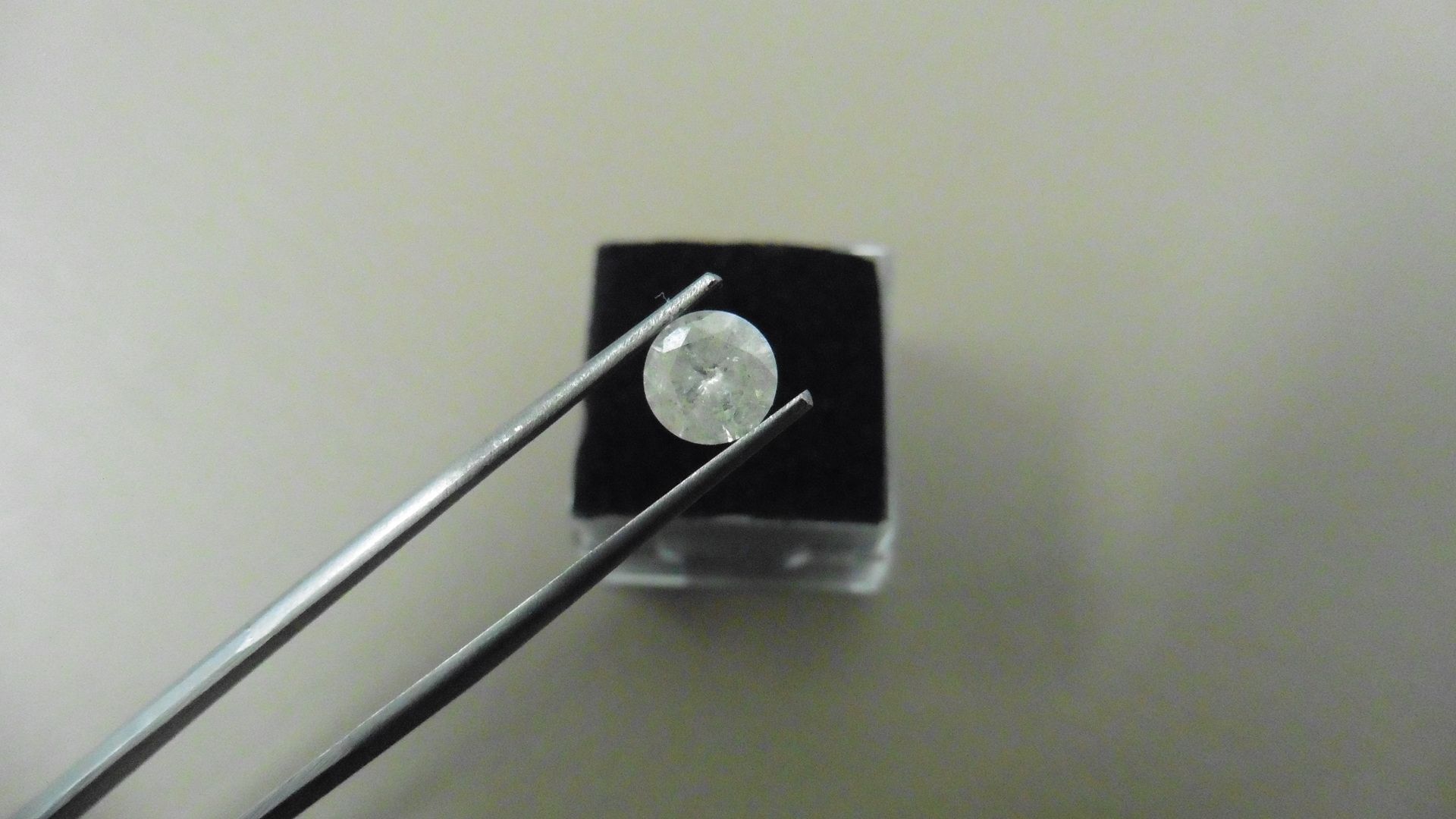 1.03ct Brilliant Cut Diamond, Enhanced stone. I colour, I2 clarity. 6.58 x 3.75mm. Valued at £