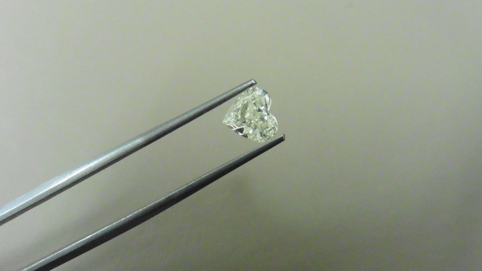 0.91ct heart shaped diamond, loose stone.J colour and Si clarity. No certification but can be done