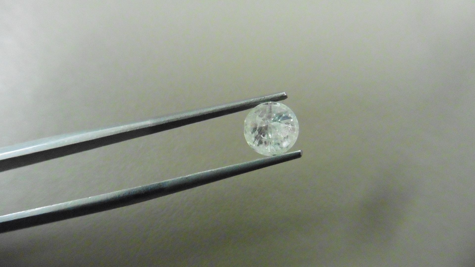 1.02ct Brilliant Cut Diamond, Enhanced stone. H colour, I2 clarity. 6.27 x 4mm. Valued at £1490. - Bild 3 aus 4