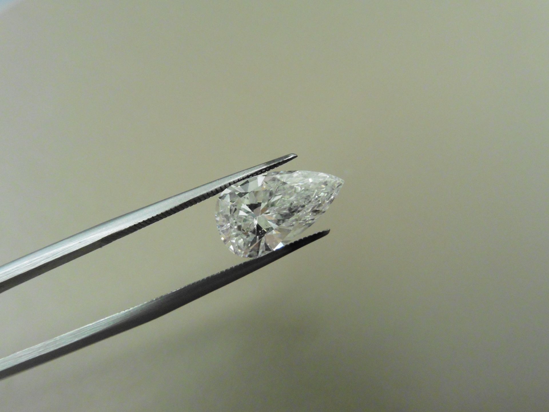 1.67ct enhanced pear shaped diamond. E colour and Si2clarity ( laser drilled ). EGL certification.