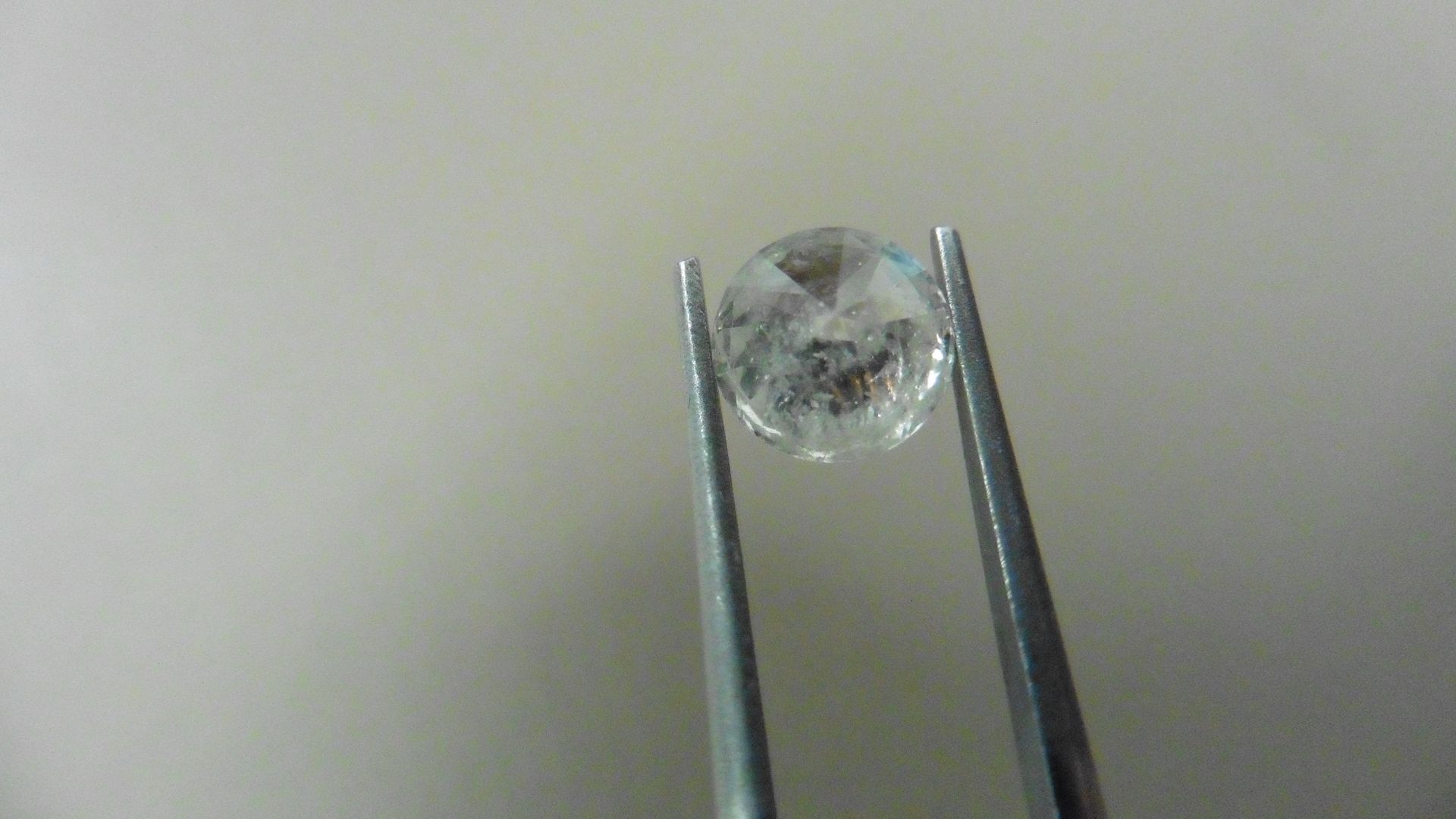 1.55ct Brilliant Cut Diamond, Enhanced stone. H colour, P1-2 clarity. 7.07 x 4.73mm. Valued at £ - Bild 2 aus 5