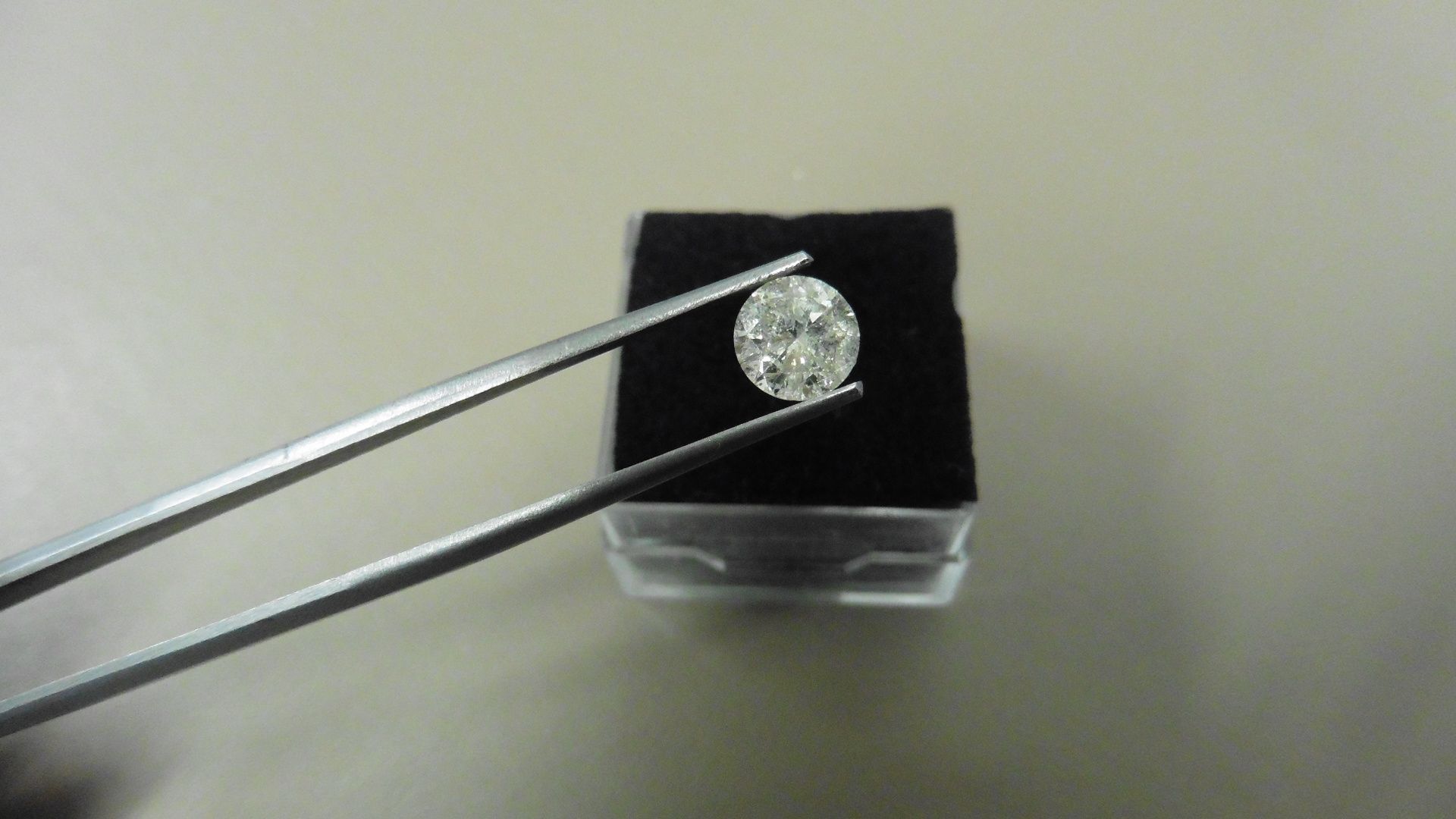 1.16ct Brilliant Cut Diamond, Enhanced stone. I colour, I2 clarity. 6.68 x 4.06mm. Valued at £