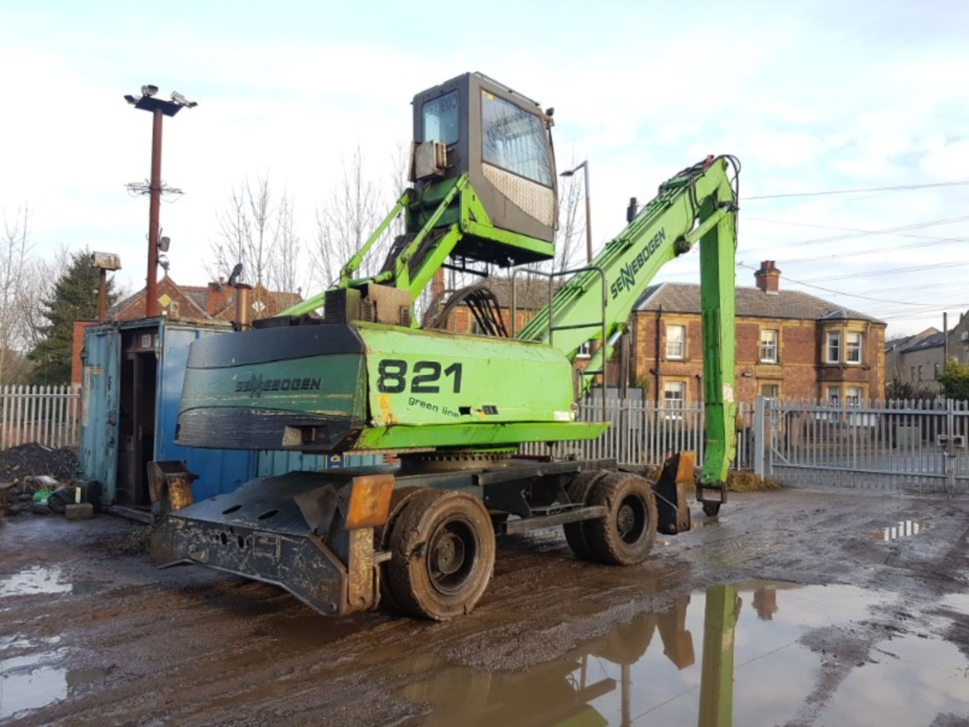 Sennebogen 821 2001, Hydraulic high cab scrap handler with magnet gear and solid tyres