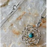 925 Sterling Silver Flower Pendant 24/21mm inc 0.80 cts Turquoise round Cabachon to middle