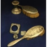 A group of various antique hallmarked silver items for scrap or repair to include two hairbrushes, a