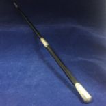 A George V ebonised Conductor's Baton with sterling silver handle, collar and tip. London 1919 by