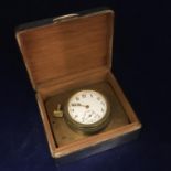 A brass travel clock within a silver presentation box engraved "Berks and South Oxon L.T.C Captain's