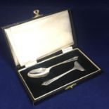A vintage sterling silver baby pusher cutlery set in fiited case, Birmingham 1960 by Barker