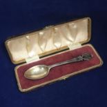 An Edwardian cased sterling silver Christening spoon. Chester 1906 by Walker and Hall. Length 13.