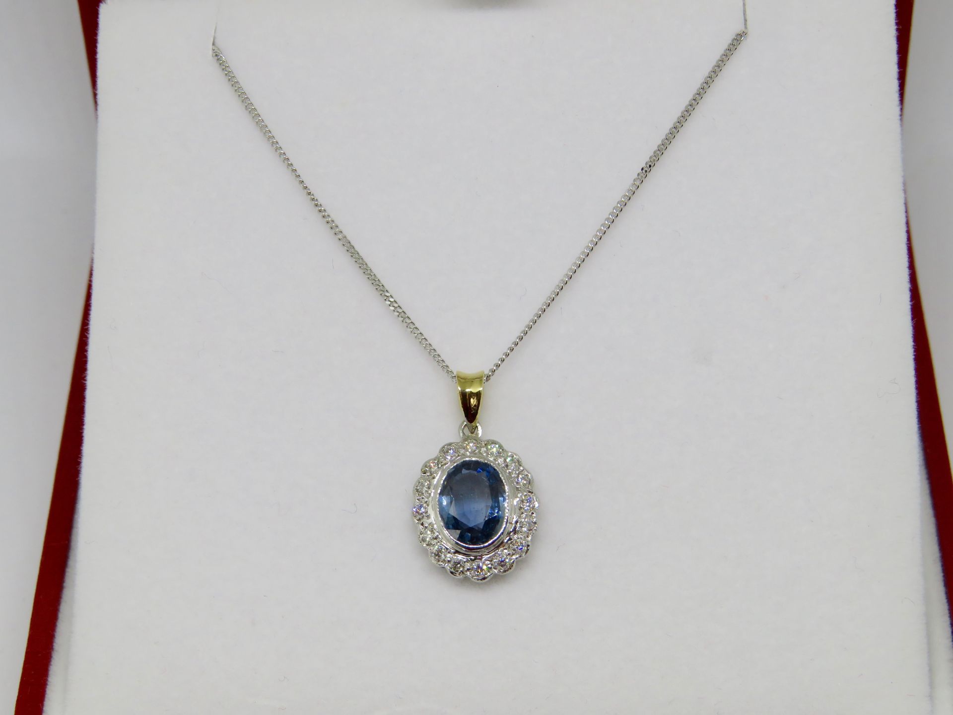 18ct White Gold Ceylon Sapphire 1.25ct & Diamond Pendant and Chain. - Image 2 of 2