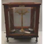 Antique L Oertling Scientific Scales in Glass Oak Framed Case.