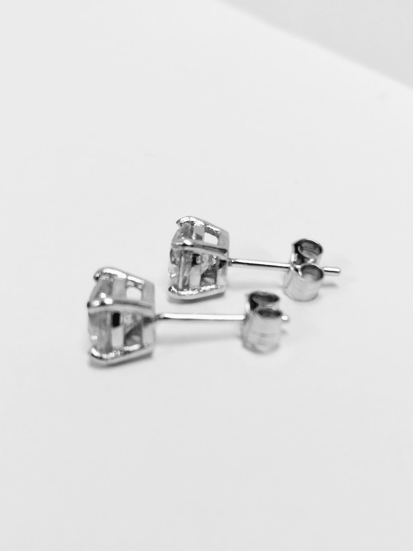 2.00ct Solitaire diamond stud earrings set with brilliant cut diamonds which have been enhanced - Image 3 of 3