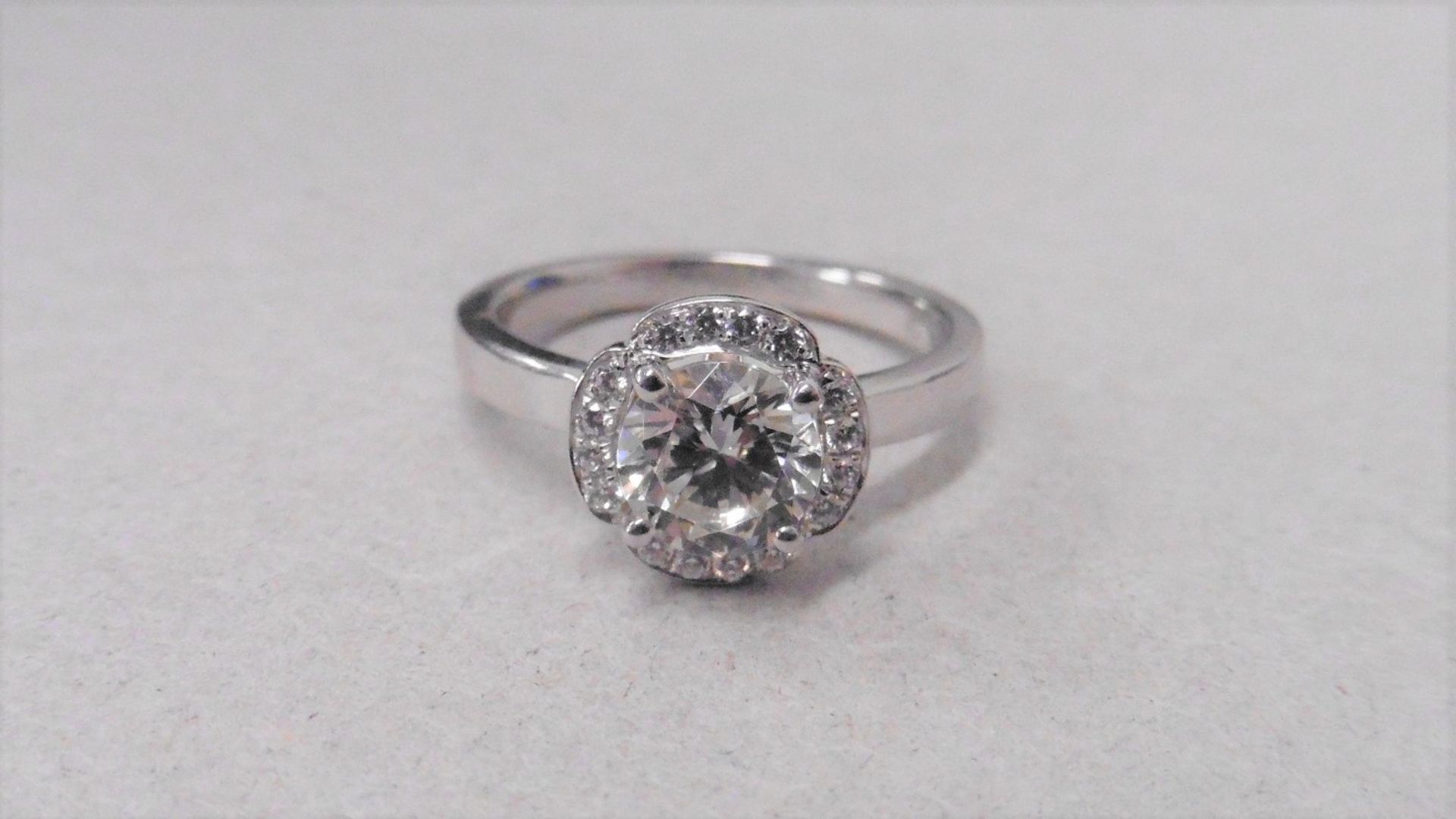 1.04ct diamond set soliatire ring in platinum. H colour and I1 clarity. Halo setting small - Image 3 of 3