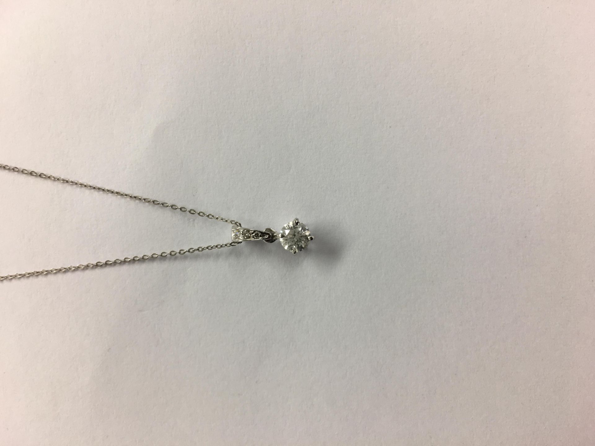 8ct white gold diamond pendant,0.33ct brilliant cut diamond h colour i1 clarity,diamond set mount - Image 4 of 5