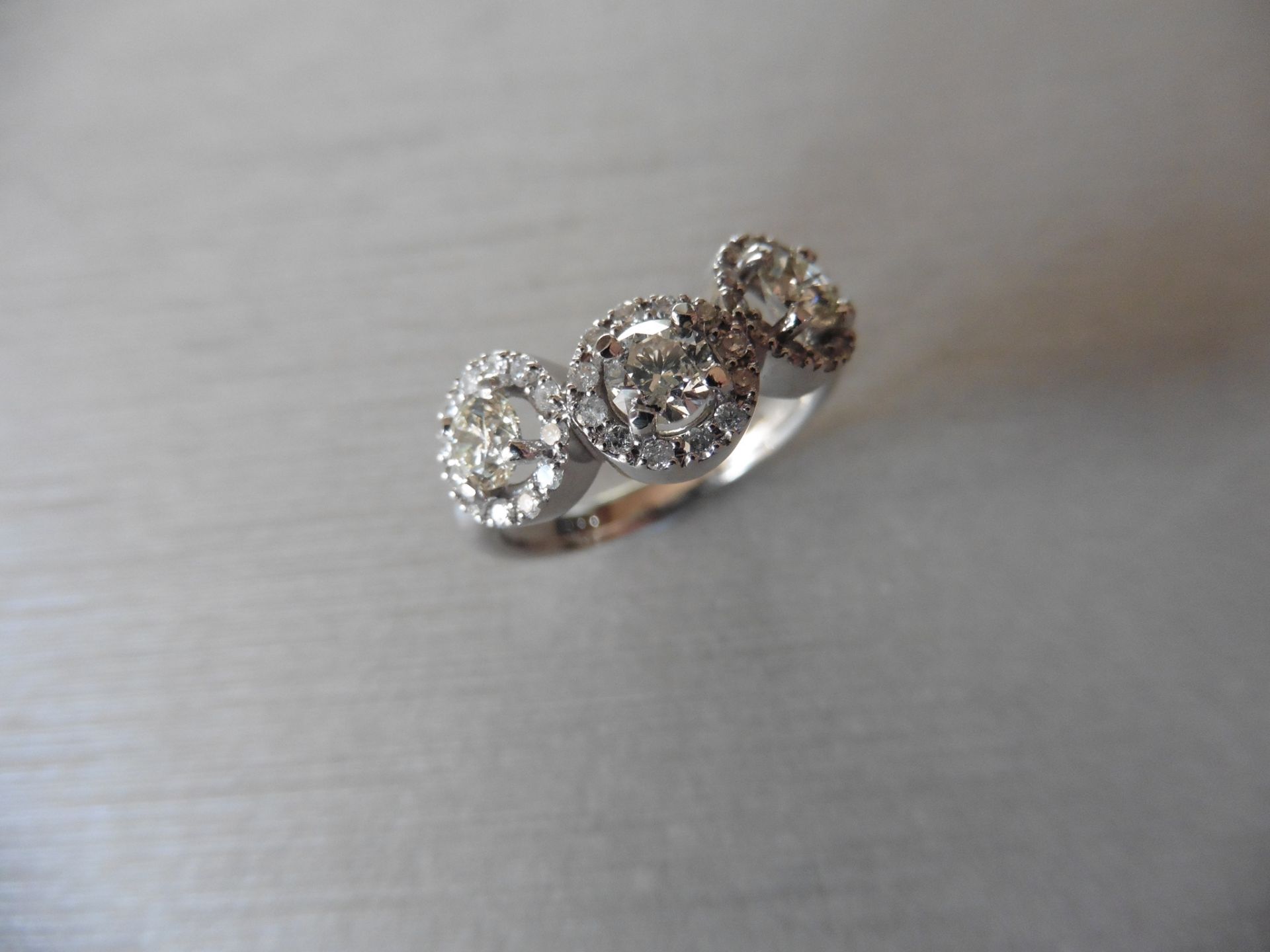 18ct white gold Italian Three stone Halo ring,3x 0.20ct brilliant cutdiamonds si clarity i colour, - Image 4 of 4