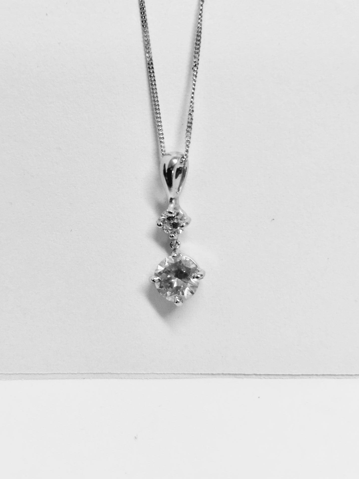 0.60ct diamond drop pendant set in 18ct white gold. 0.50ct on the bottom with 0.10ct on top. I-J