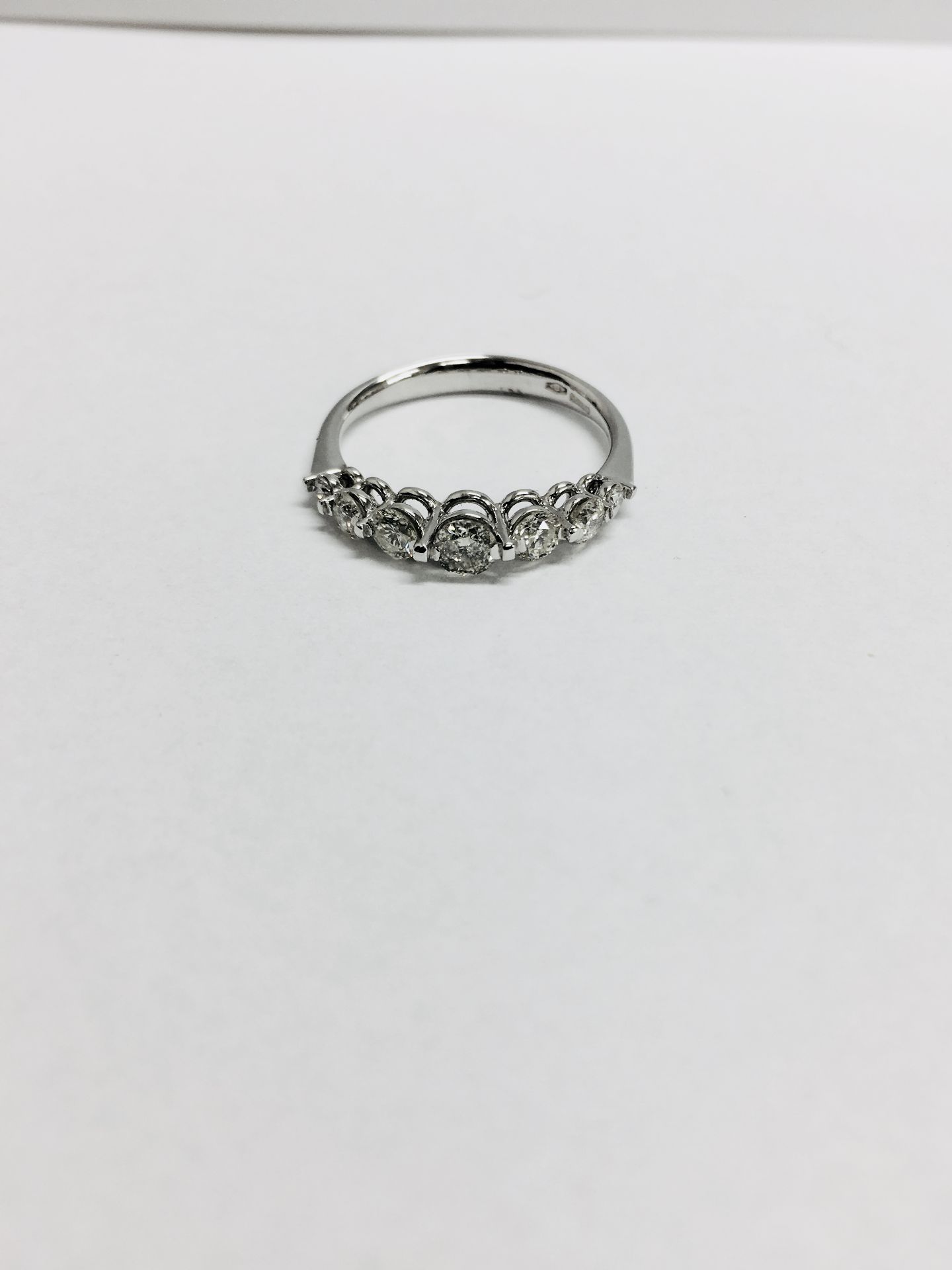 0.60ct diamond band ring set in 14ct white gold. 7 graduated brilliant cut diamonds, I colour and - Image 4 of 4