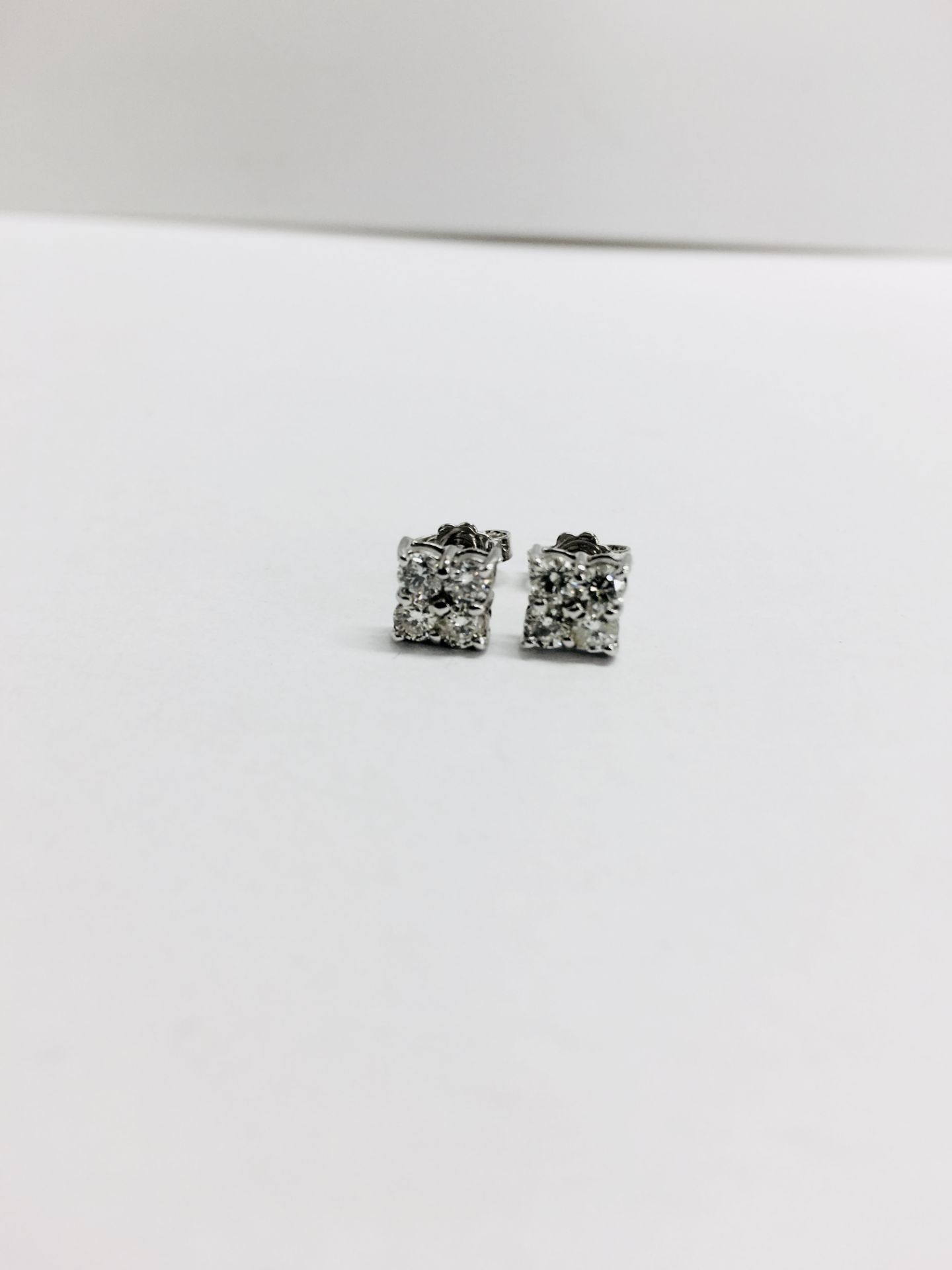 0.80ct dimond cluster style stud earrings. Each set with 4 small brillint cut diamonds, I colour and - Image 2 of 2