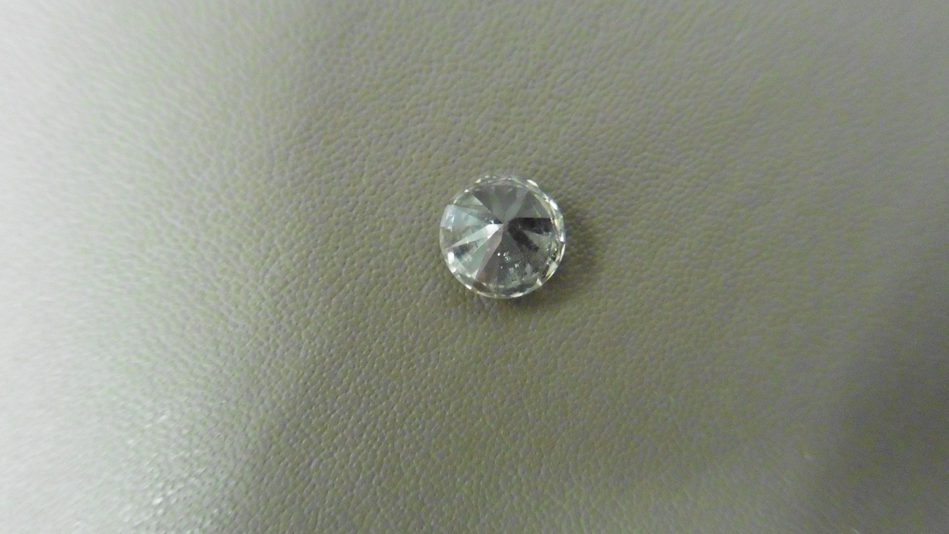 1.04ct brilliant cut diamond, loose stone.K colour and I1 clarity. 6.36 x 6.42 x 4.07mm. IGI - Image 3 of 5