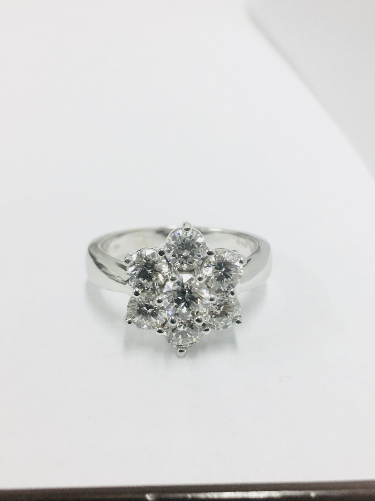 2.25ct diamond cluster style dress ring. 7 Brilliant cut diamonds, I colour and si2-3 clarity.