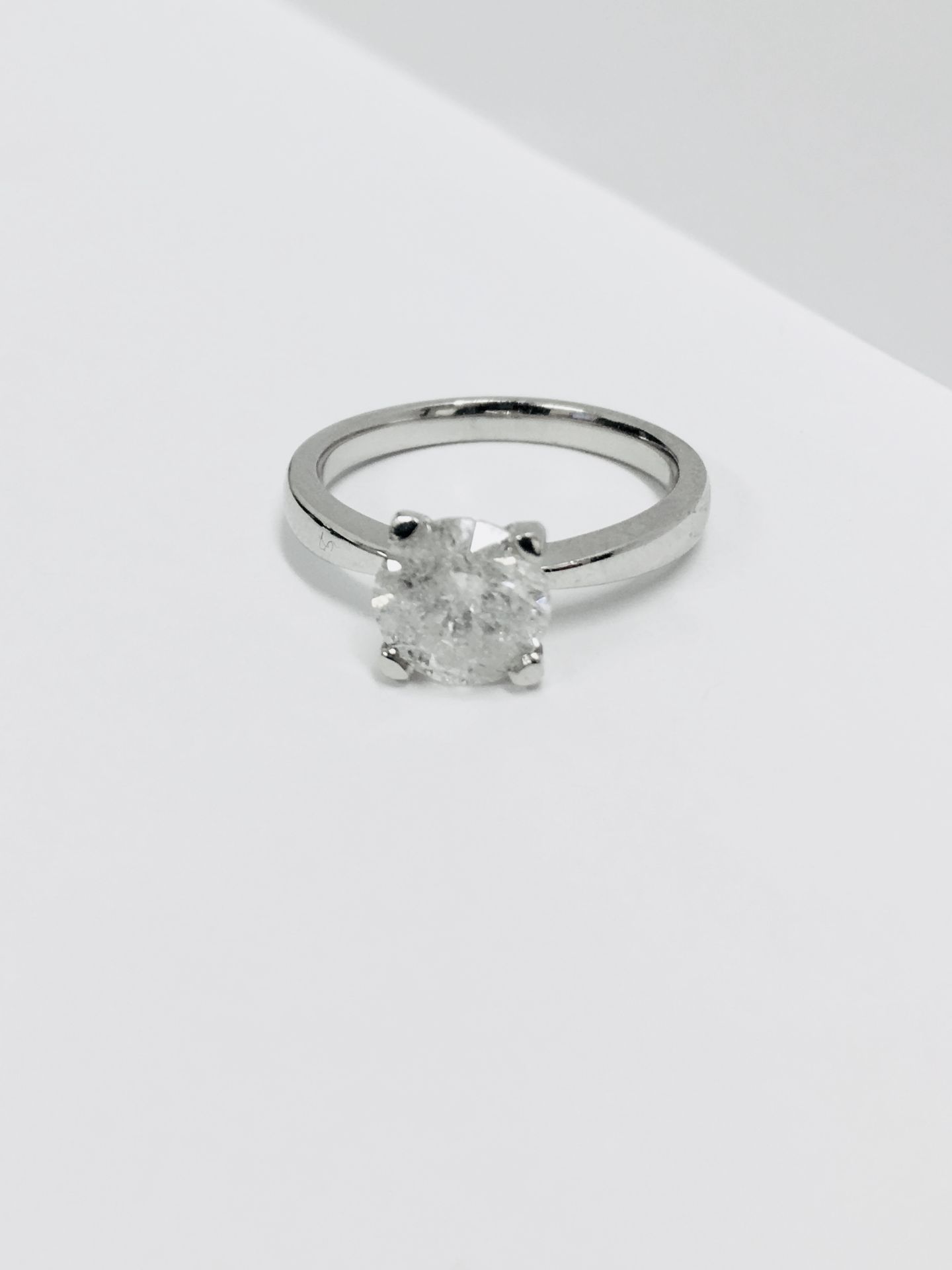 1.50ct diamond solitaire ring set in platinum. Enchanced diamond, H colour and I2 clarity. 4 claw