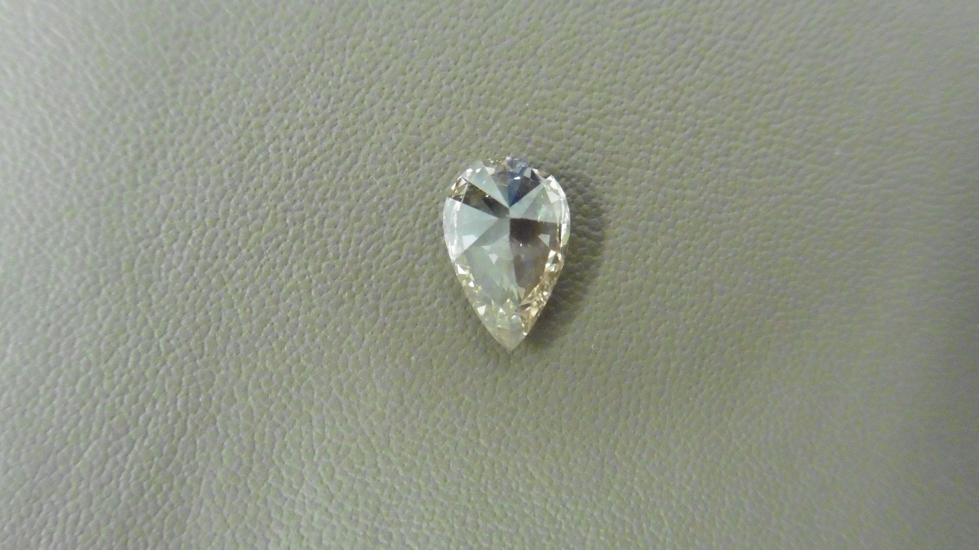 1.02ct pear shaped diamond, loose stone. N ( faint brown ) colour and SI1 clarity. 8.85 x 5.79 x 3. - Image 3 of 5