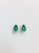 9ct white gold emerald diamond earrings ,9K White gold 1.40gms 40 Round diamonds 0.17ct 2 Emeralds