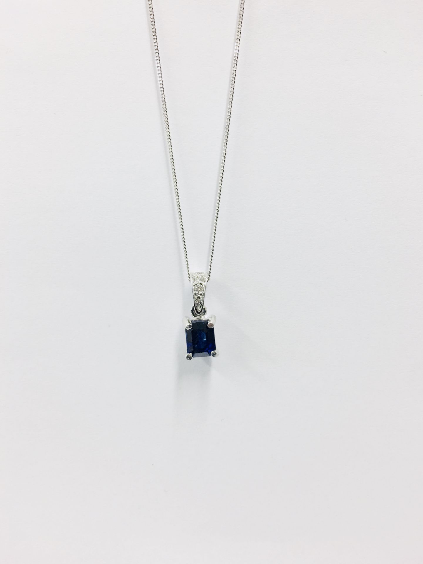 18ct white gold sapphire diamond pendant,0.50ct 5mmx4mm sapphire(treated) 0.03ct diamond set bale