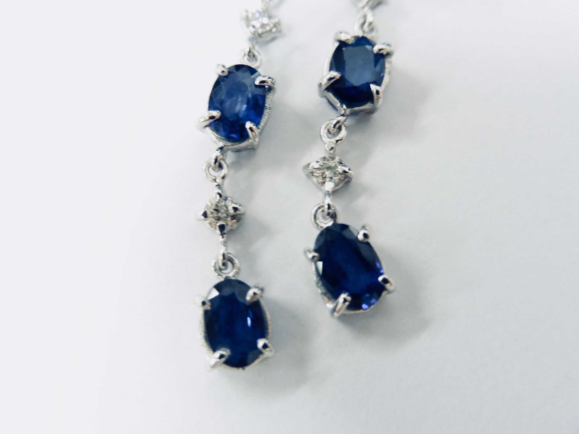 Sapphire and diamond drop style earrings set in 18ct gold. Each set with 3 oval cut ( treated) - Bild 2 aus 4