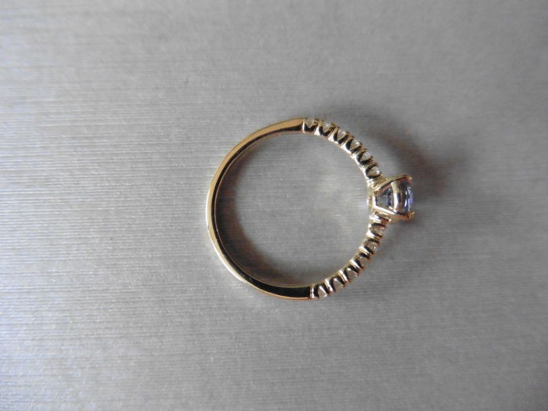 0.80ct / 0.12ct ceylon sapphire and diamond dress ring. Oval cut ( treated ) sapphire with small - Bild 3 aus 3