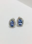 9ct white gold tanzanite diamond earrings,9K white gold 1.40gms 42 round diamonds 0.18ct