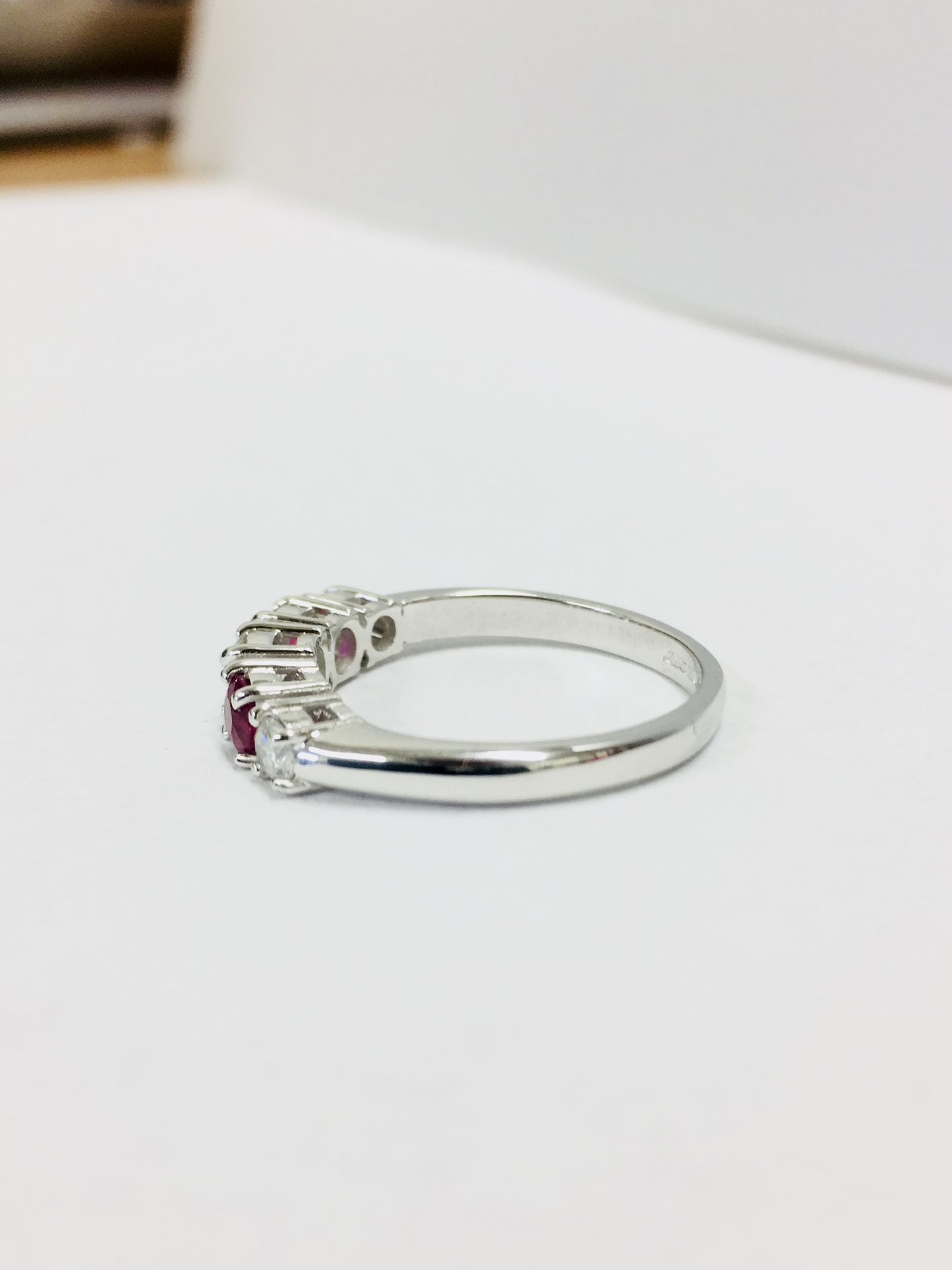 0.75ct ruby and diamond five stone ringset in 18ct gold. 2 rubies( treated ) 3 brilliant cut - Image 2 of 4