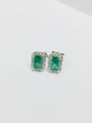 9ct white gold emerald diamond stud earrings,9CT white gold 1.15gms 32Round diamonds 0.17ct