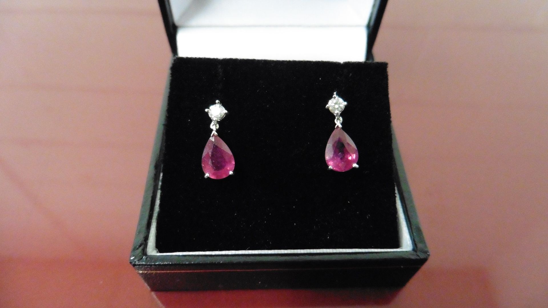 0.70ct drop style earrings. Each set with a pear shaped ruby ( glass filled ) and a small - Image 3 of 3
