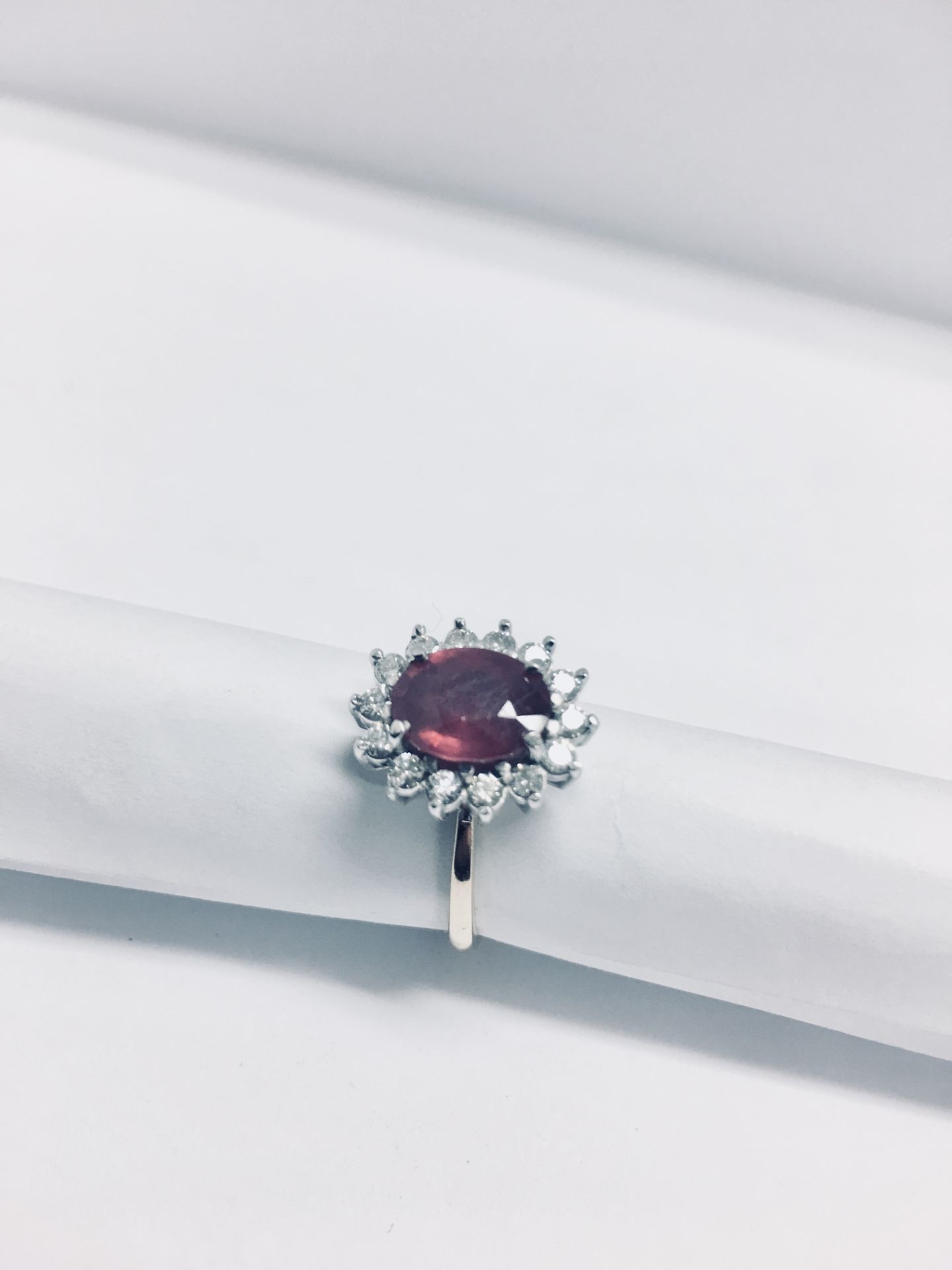 18ct white gold Ruby diamond cluster ring,2.50ct ruby (treated),9mmx7mm,0.56ct diamonds,si2 I - Image 2 of 3