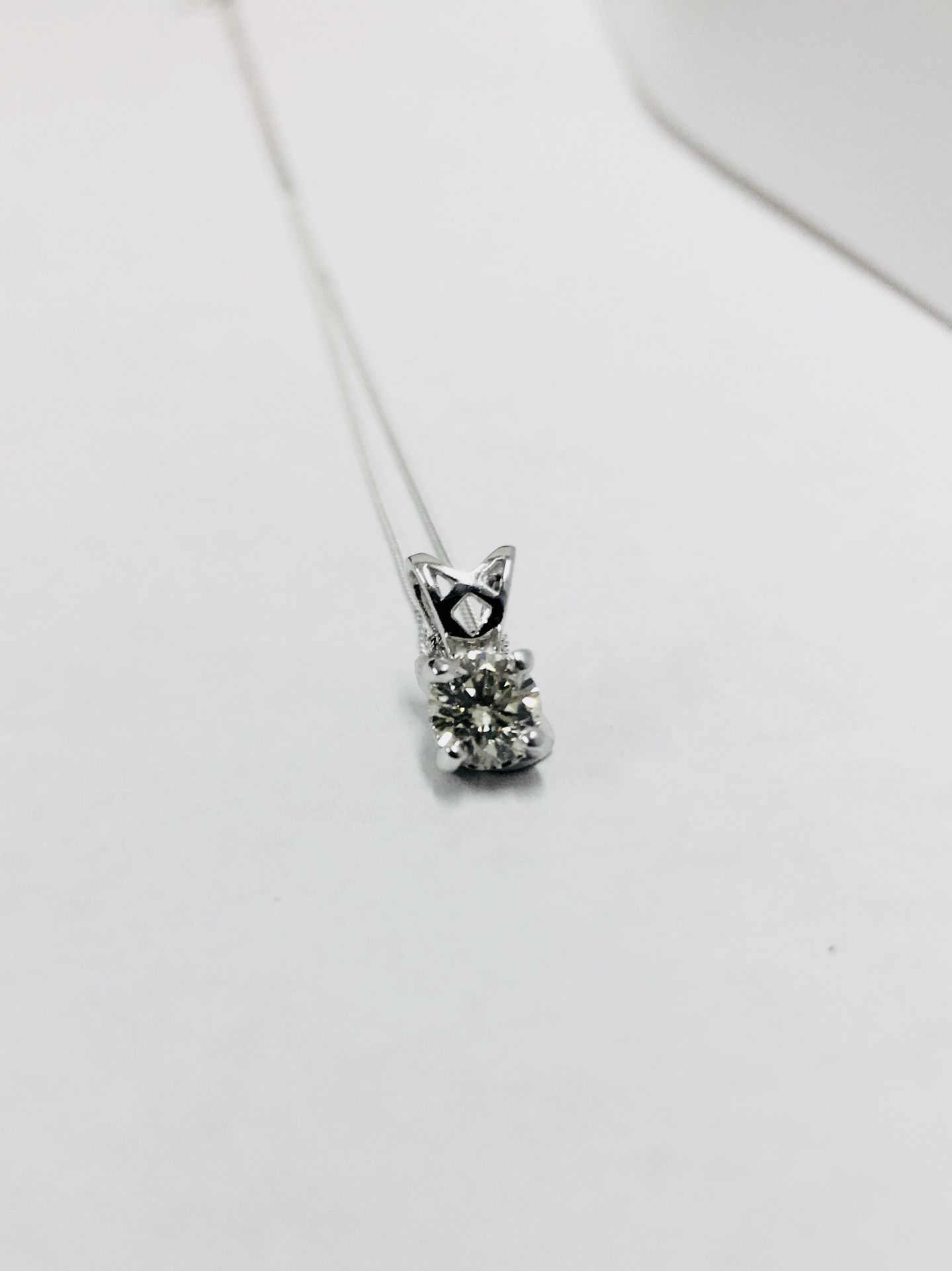 0.33ct diamond set pendant. Brilliant cut diamond, I colour and si3 clarity.4 claw setting with - Image 2 of 3