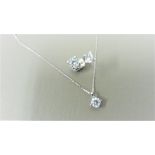 0.35ct / 0.70ct diamond pendant and earring set in platinum. Pendant - 0.35ct brilliant cut diamond,