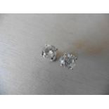 2.00ct Solitaire diamond stud earrings set with brilliant cut diamonds. I colour, I1-2 clarity Set