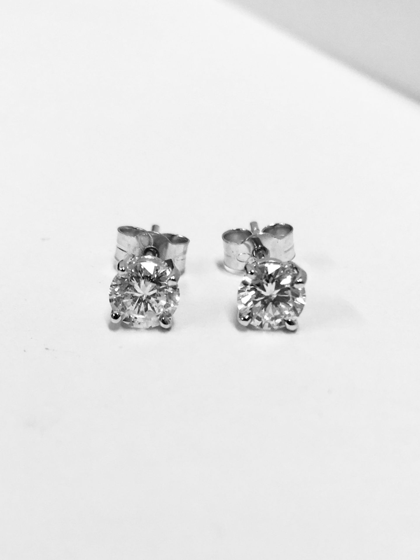 1.00ct diamond solitaire stud earrings set in platinum. I/J colour, si3-i1 clarity.4 claw setting - Image 4 of 4