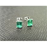 1.40ct stud earrings in platinum 950. 2 rectangular cut emeralds ( treated ) set in a simple 4