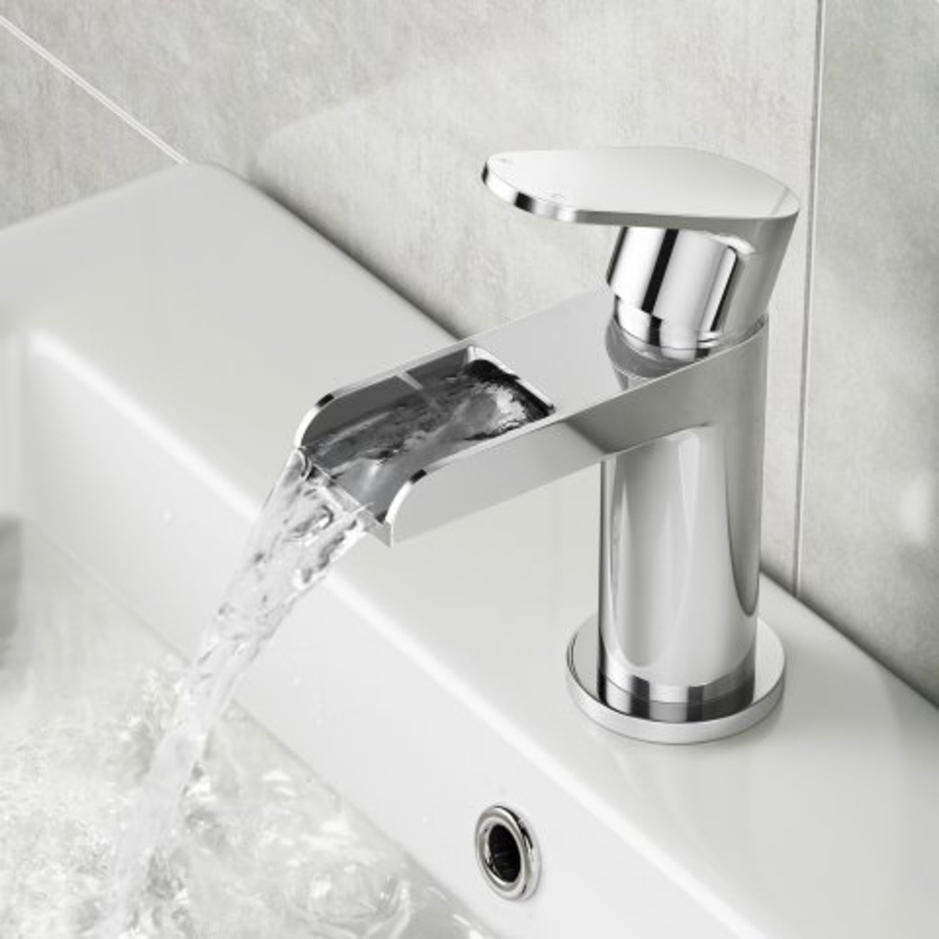 (V103) Cela Waterfall Basin Mixer Tap Presenting a contemporary design, this solid brass tap has