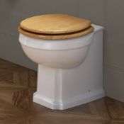 (T172) Victoria II Traditional Back To Wall Toilet - Oak Effect Seat. RRP £374.99. This classic back